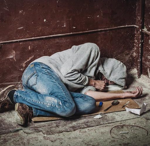 sobergrind-Meth-Addiction-photo-of-an-addict-with-a-syringe-using-drugs-on-the-floor